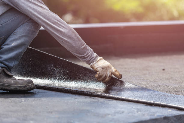 Professional Exterior Waterproofing technician working in Rossville, KS